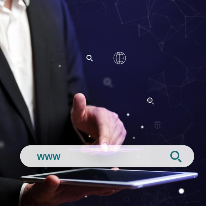 Busca por domínio de site profissional em tablet, com barra de pesquisa ‘www’ em destaque.